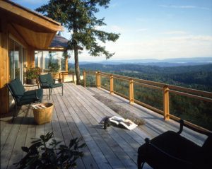 grey cedar deck, transparent stain, outdoor mountainous patio, cedar siding